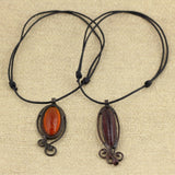 Fantasy Style Amber Color Glass and Black Tin Necklace