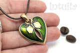 Forest Green Heart Shape Bronze Necklace with Lily of the Valley Motif